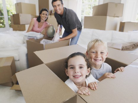 Professional flat removals in Newsouthgate with movers handling boxes