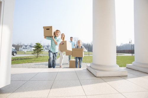 Organised household storage boxes and home belongings in Newsouthgate