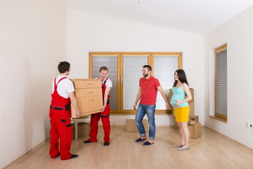Local small removals team transporting items in Newsouthgate